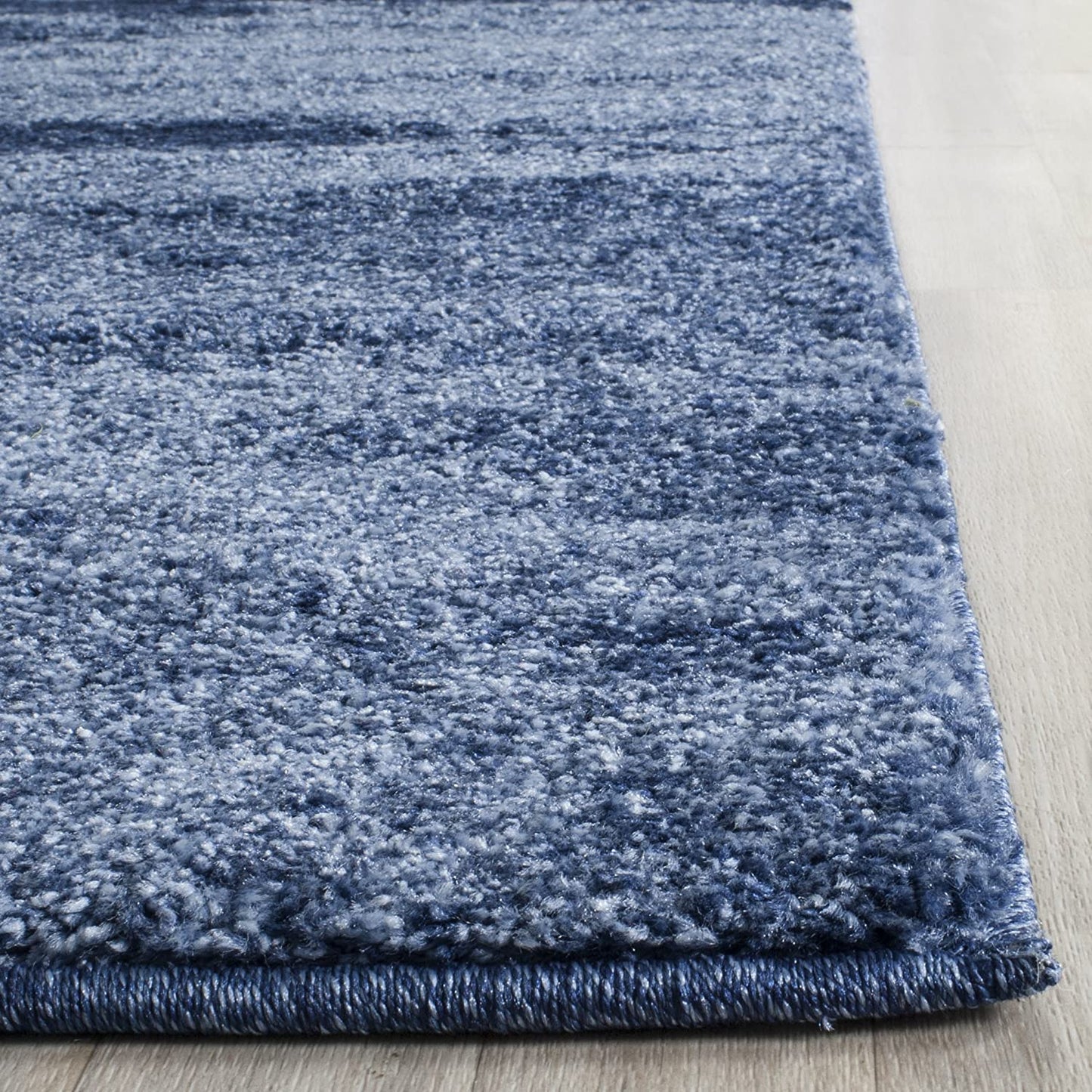 Modern Abstract Light Blue and Blue Area Rug