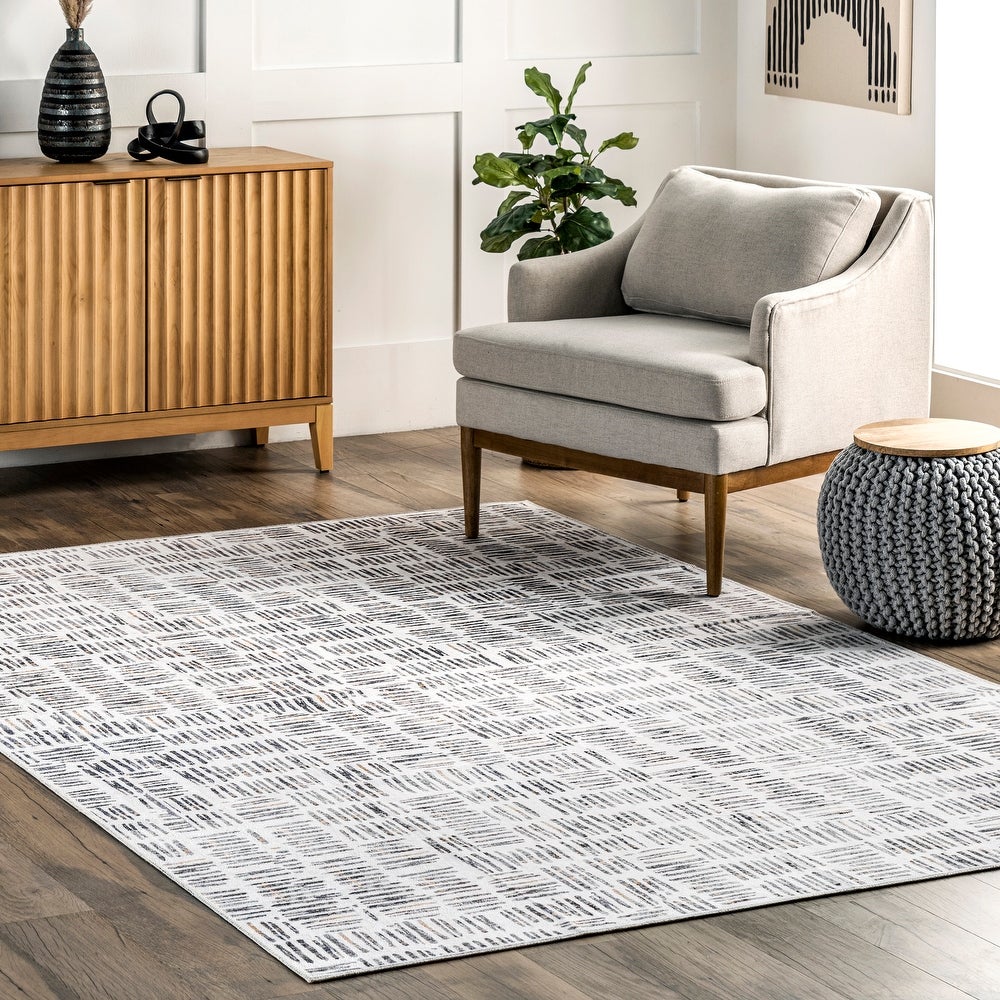 http://joannahomedecor.com/cdn/shop/products/nuLOOM-Mitzi-Abstract-Lines-Machine-Washable-Area-Rug_00e06071-cc52-4726-822b-f95ce373d626.jpg?v=1669372112