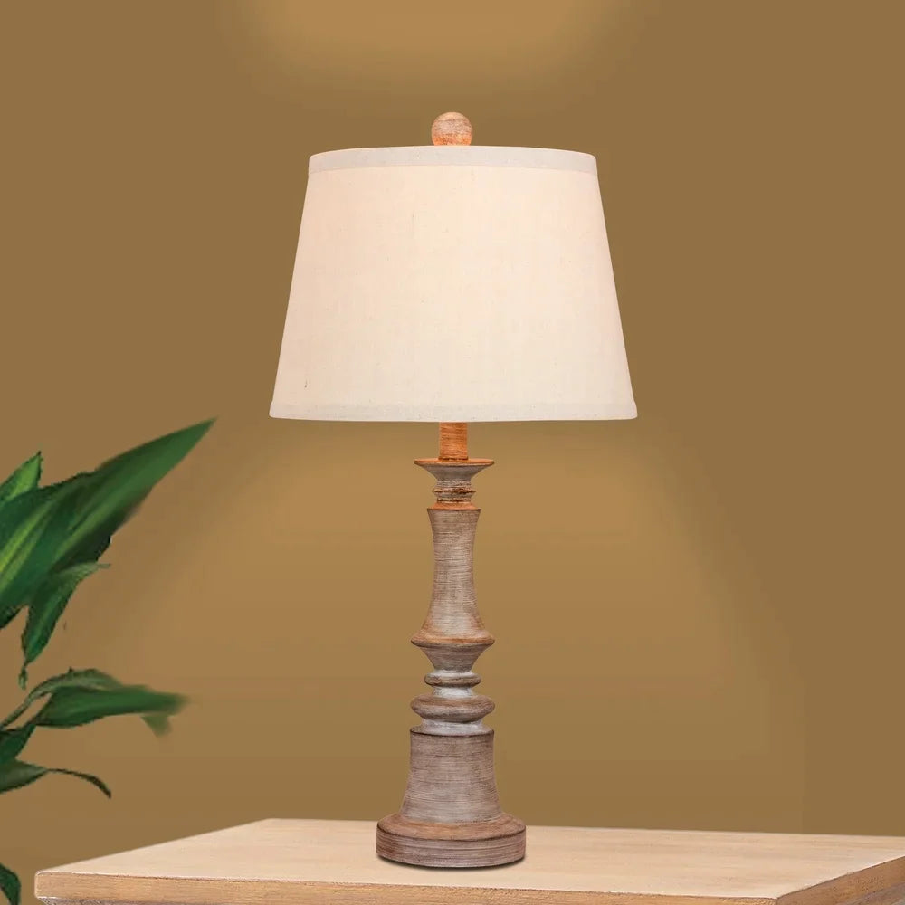 Fangio Lighting's 6240CWG 26.5 in. Candlestick Resin Table Lamp in a Cottage Weathered Gray Finish