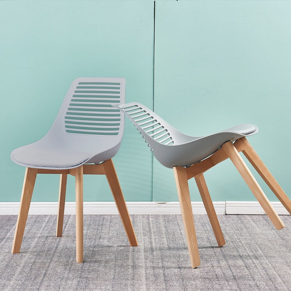 Plastic Chair for Living Room Dining Chair Bend-Resistant Home Chair with Wood Leg & Striped Leak Holes Backrest (set of 2 )