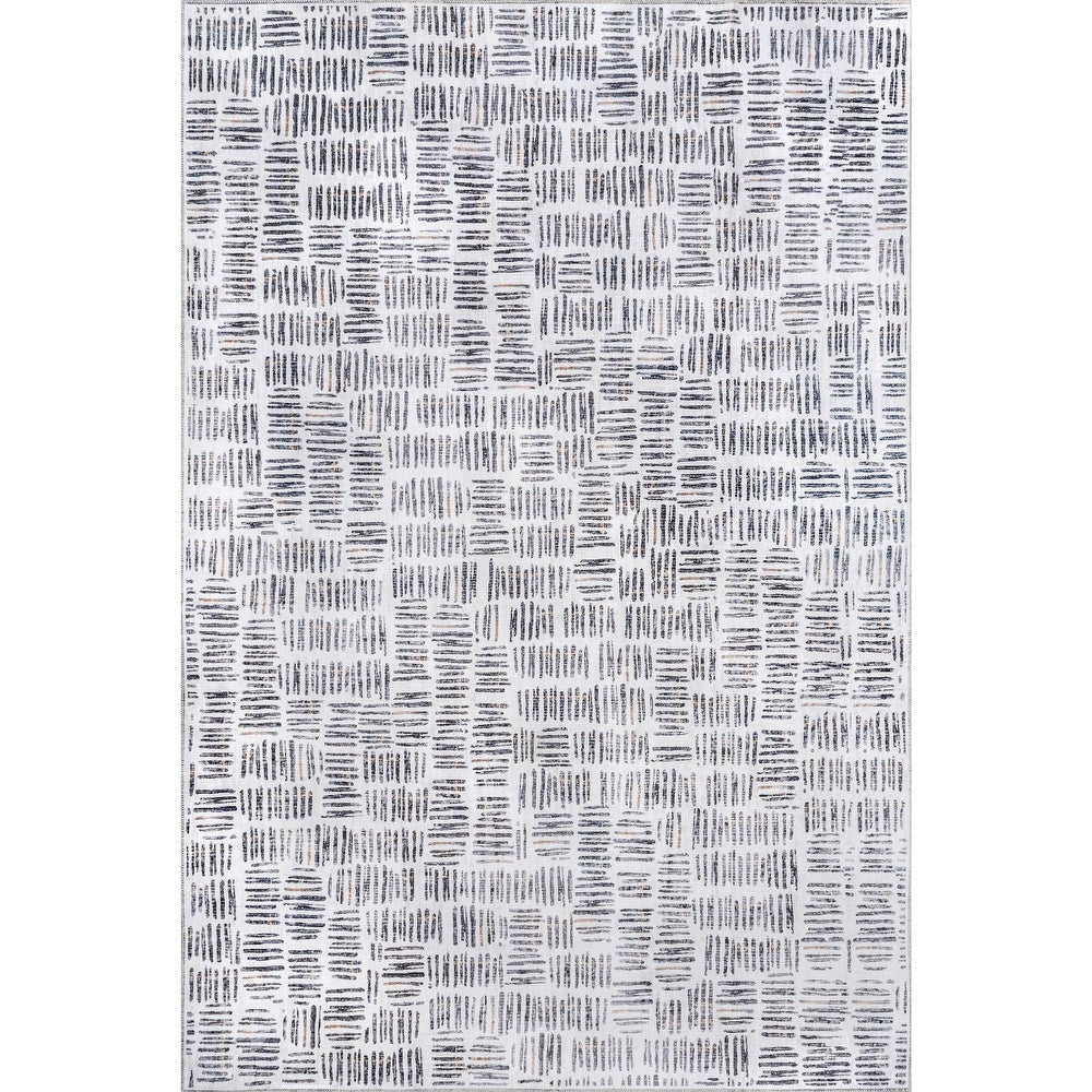 https://joannahomedecor.com/cdn/shop/products/nuLOOM-Mitzi-Abstract-Lines-Machine-Washable-Area-Rug_5c9a4469-4f87-4654-a579-de5f9eba15fd_1445x.jpg?v=1669372112